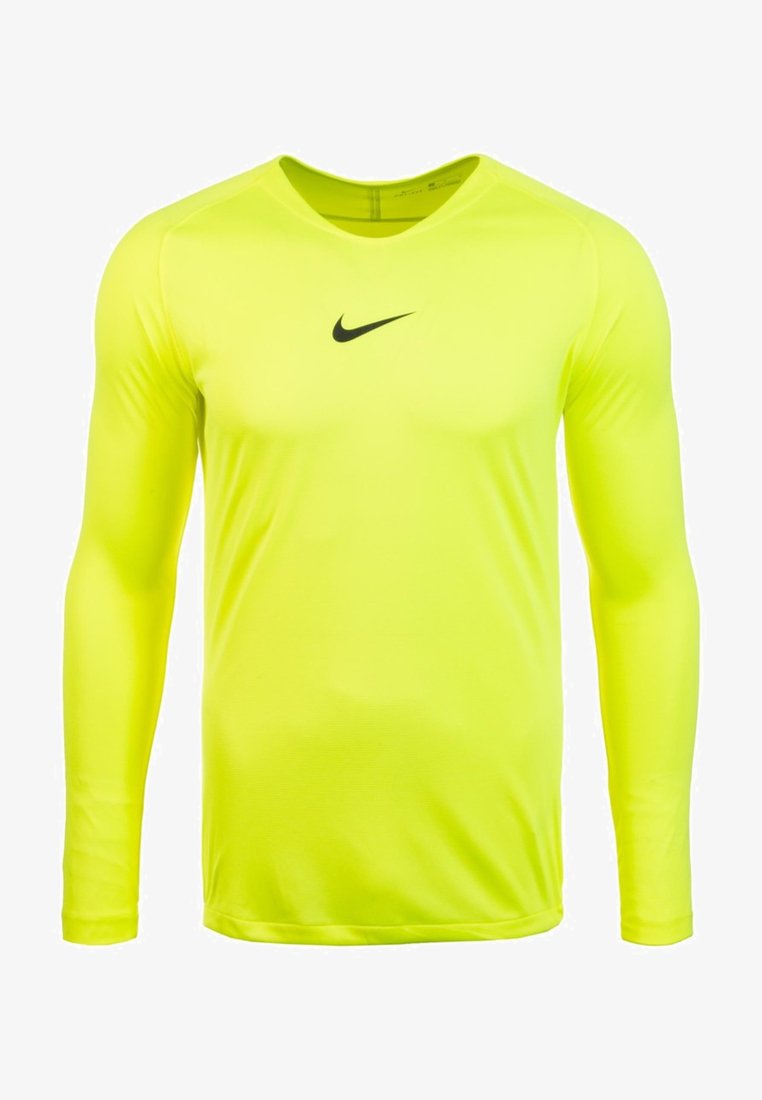Maglietta sportiva a maniche lunghe in tessuto giallo brillante, con collo rotondo e logo Nike nero sul petto. Texture liscia.