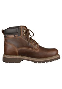 Botas de cuero marrón con punta redonda y cordones marrones. Presentan un tobillo acolchado y una suela de goma con tacos para mayor tracción. Destacan por el logotipo y los detalles de costura.