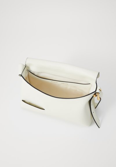 White leather clutch bag with a roll-top closure, gold hardware, and contrasting black trim. Interior features a single compartment and brand label.