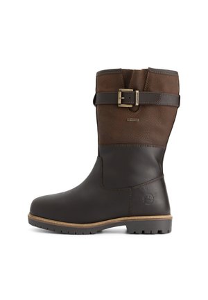 Mid-calf brown leather boot with darker brown upper, brass buckle strap, textured sole, and subtle embossed logo on the heel.