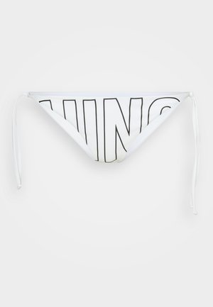 Baltos bikini kelnaitės su juodu "SAULĖ" grafiku. Visiškai reguliuojamas prisitaikymas, pririšamos iš šonų, glotni tekstūra, minimalus dengimas.