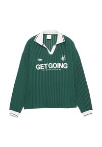 Zelený rebrovaný polo top s dlhým rukávom a bielym golierom a manžetami. Na prednej strane je biely nápis "GET GOING" spolu s logom značky a rokom 1991.