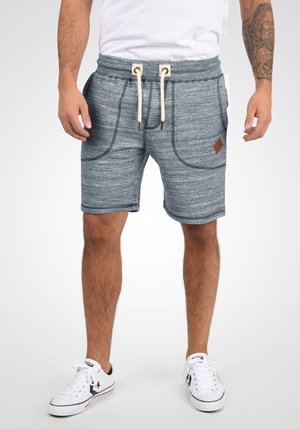 Gray melange shorts with an elastic waistband, drawstring, and two side pockets. Features a textured fabric and a brown leather logo accent.