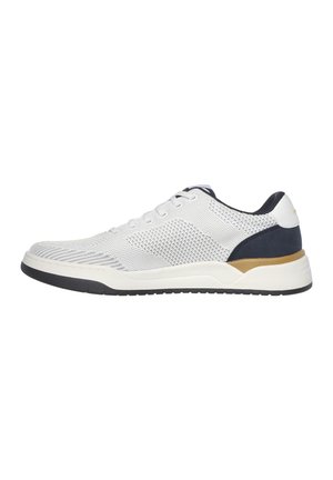 White mesh sneaker with navy and gold accents, featuring a textured upper, round laces, and a black rubber sole.