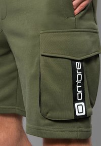 Ombre OM-SRSK - Pantalones deportivos - olive green