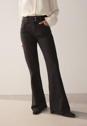 HIGH RISE STRETCH - Džinsi ar paplatinātiem galiem - chocolate brown