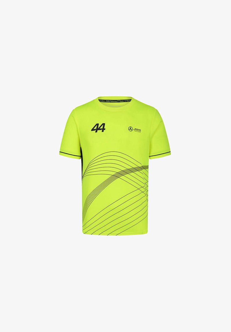 Neon żółta koszulka z krótkim rękawem, z czarnym numerem "44" oraz abstrakcyjnymi wzorami linii. Logo nadrukowane na klatce piersiowej.