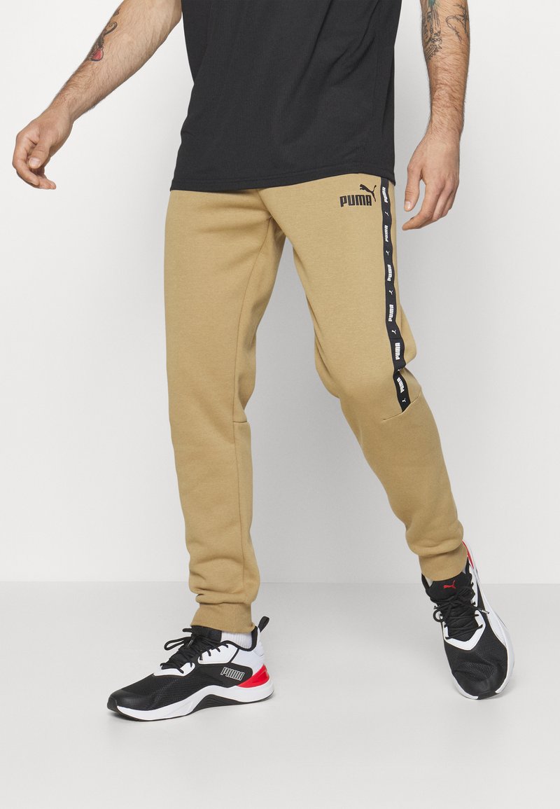 survetement puma marron