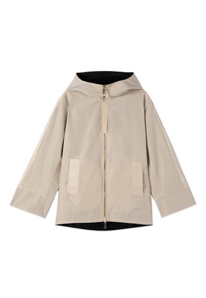 Beige capuchonjas met ritssluiting aan de voorkant, twee klepzakken, lange mouwen en een zwarte binnenvoering.