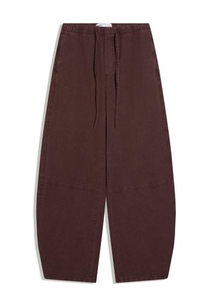 Voľné, tmavohnedé nohavice s elastickým pásom a sťahovacou šnúrkou, s výraznými švami na nohaviciach.