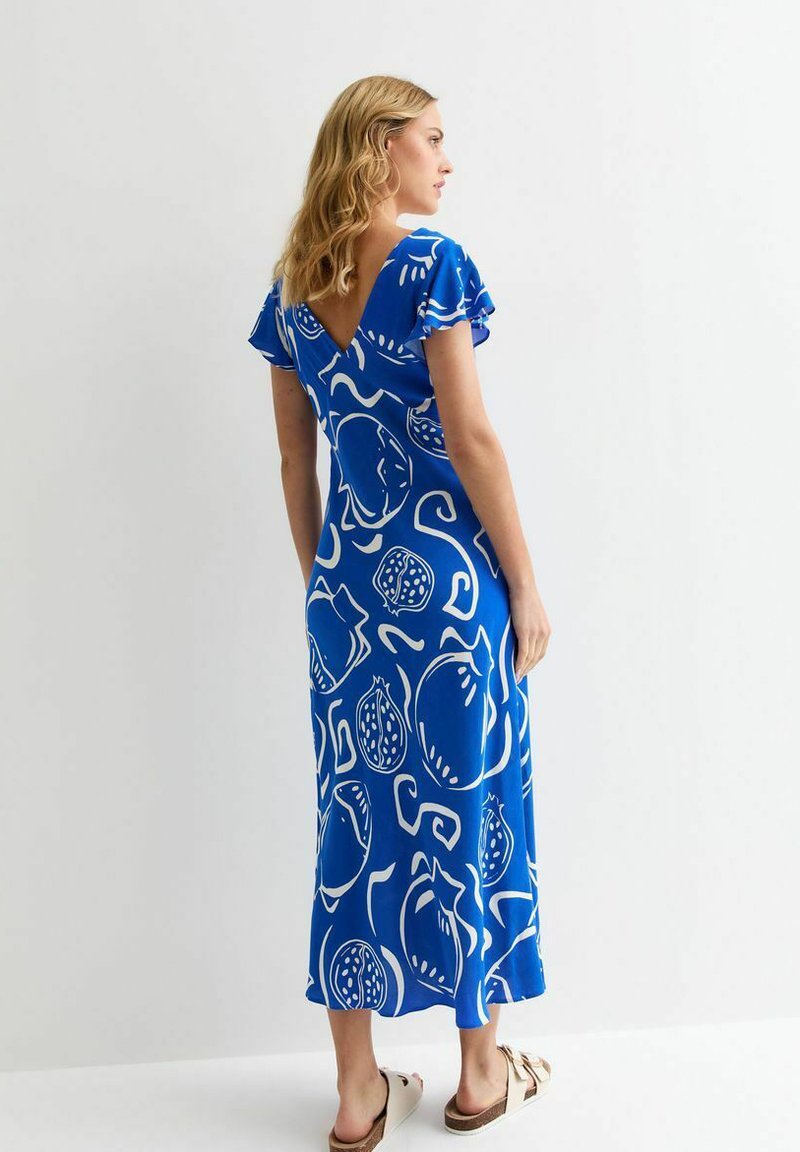 white christmas dresses Fruit swirl Clementine dress – Love, Charlotte main image 1