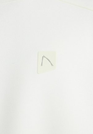 Witte sweatshirtstof met een getextureerd, driehoekig paneel met een subtiel reliëfpatroon en lichtgrijze accenten.