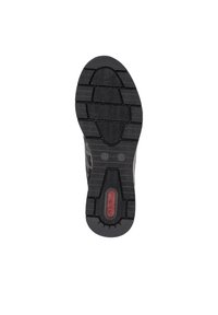 Semelle extérieure de sneaker noire avec texture striée pour l'adhérence, avec un logo rouge et la taille numéro 37 en relief près du talon.