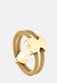 Gold-toned double-band ring features a woven texture with a heart and clover-shaped accents, showcasing a polished finish and smooth edges.
