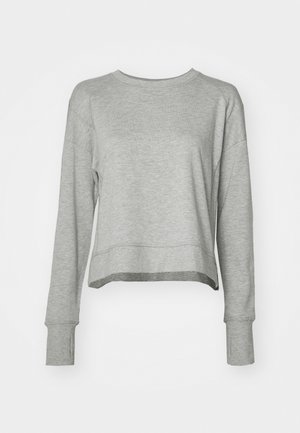 Sweatshirt cinzento cropped com mangas longas, feito de um tecido suave. Apresenta um design simples, decote redondo e punhos canelados.