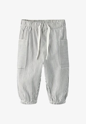Pantalones blancos para bebé con rayas verticales negras, cintura elástica, cordón, dos bolsillos laterales con rayas horizontales y puños elásticos.