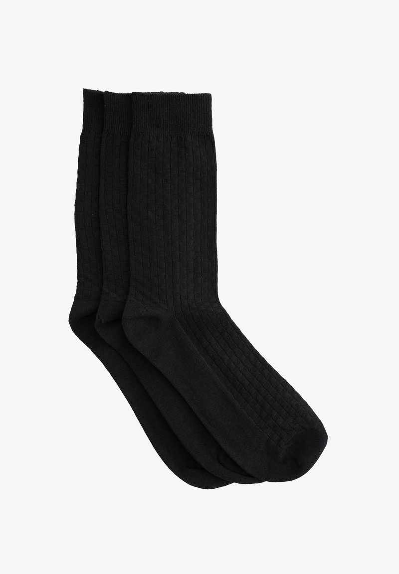 Balenie troch čiernych ponožiek s rebrovanou textúrou a pevným dizajnom. Materiál z bavlneného zmesi ponúka pohodlie a odolnosť.