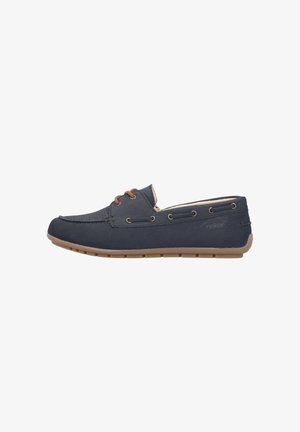 Mocassin en cuir bleu foncé avec lacets marron, dessus perforé et semelle en caoutchouc marron clair, vu de côté sur fond blanc.