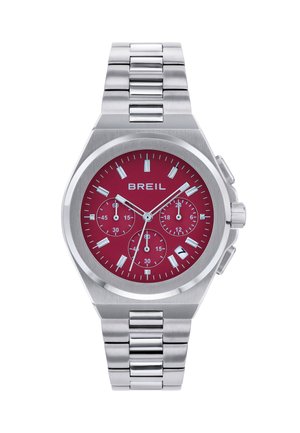 Sølv rustfrit stål chronograph ur med en rød urskive, hvide timemarkører og datovisning; har et sammenkoblet armbåndsdesign.