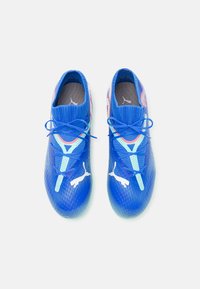 Puma FUTURE 7 PRO FG/AG JR UNISEX - Kopačky na pevný povrch - bluemazing/white/electric peppermint