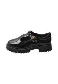 Czarne lakierowane buty Mary Jane z okrągłym noskiem, zapięciem na klamrę oraz grubą gumową podeszwą z teksturowanym bieżnikiem.