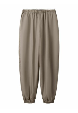 Beige, schmal zulaufende Hose mit elastischem Bund und gesammelten elastischen Bündchen, aus glattem Stoff, geeignet für die Freizeit.