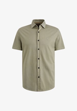 Chemise à manches courtes, à boutons, de couleur vert olive clair, fabriquée en tissu texturé avec des boutons noirs et un logo discret sur la poitrine.