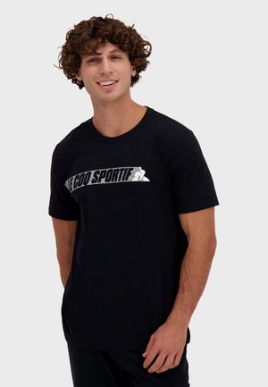 T-shirt en coton noir à manches courtes, avec un logo imprimé sur le devant. Design classique à col rond pour un fit décontracté.