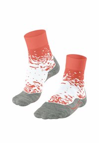 Knöchelsocken mit einem korallenfarbenen oberen Teil und einem weißen Körper, der ein strukturiertes rotes Muster zeigt; graue strukturierte Sohlen sorgen für Grip und Langlebigkeit.