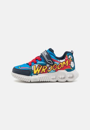 Blue sneaker with red laces and a graphic design featuring "WROOOM!" in yellow. White sole with visible air cushioning details.