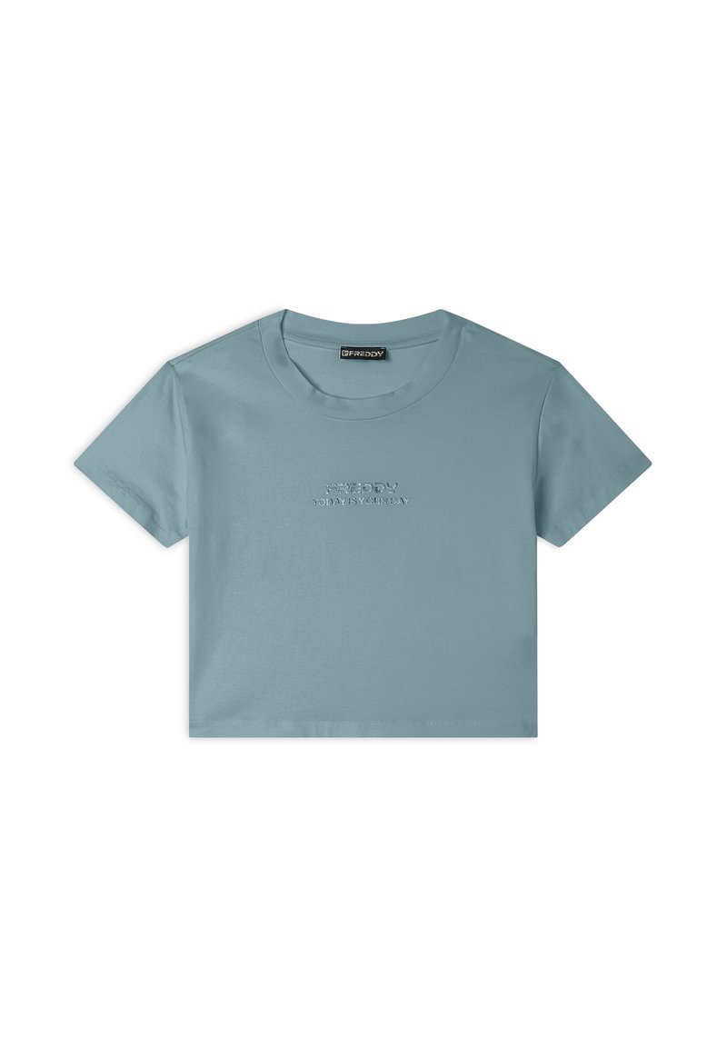 T-shirt cropped azzurro cielo realizzato in cotone morbido. Presenta maniche corte e un collo rotondo. Testo in lettere in rilievo sulla parte anteriore.