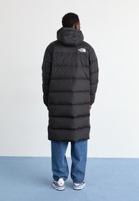 The North Face NUPTSE - Kaput ispunjen paperjem - black