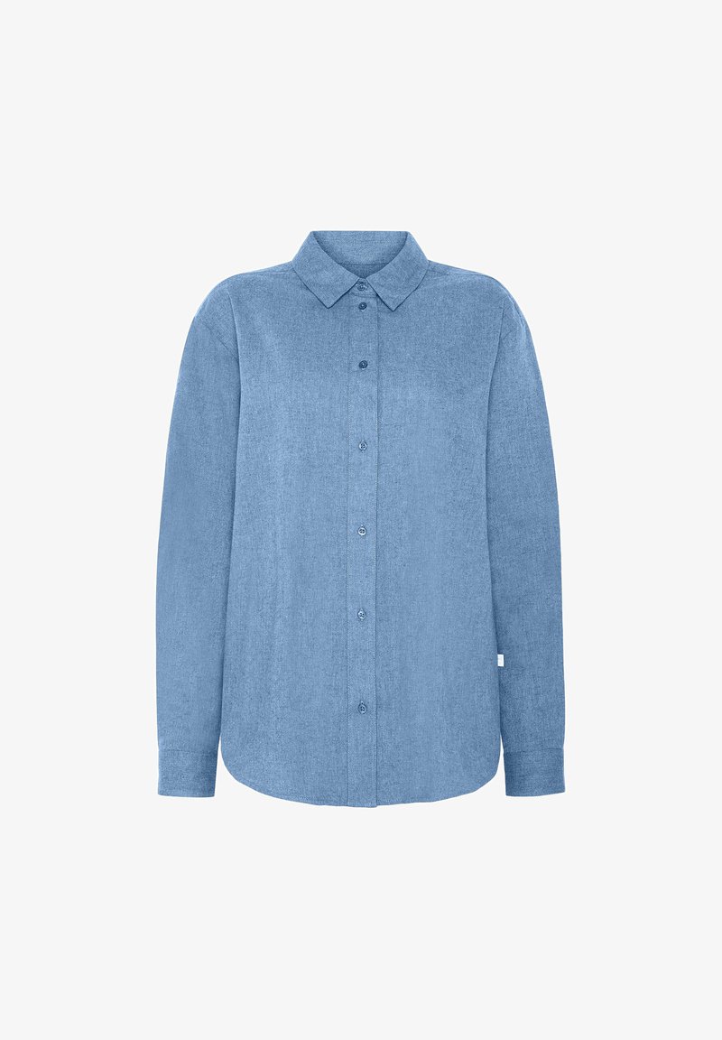Light blue long-sleeve shirt in a solid texture, featuring a classic collar and button closure, with a slightly curved hem.