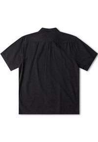 Chemise noire manches courtes avec boutons, col classique, couture visible sur le haut du dos et texture florale subtile.