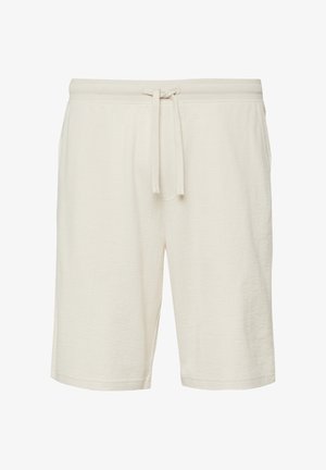 Casual korte broek in roomkleur met een elastische tailleband en een trekkoord, voorzien van zijzakken en een knielange snit.