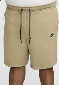 Nike Sportswear SPORTSWEAR TECH FLEECE - Tracksuit bottoms - neutral olive black