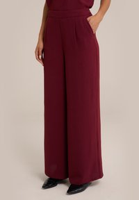 WE Fashion Auduma bikses - red