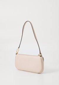 Pale pink leather handbag with a slim design, gold hardware, and a brown strap. The bag features a zipper closure and smooth texture.