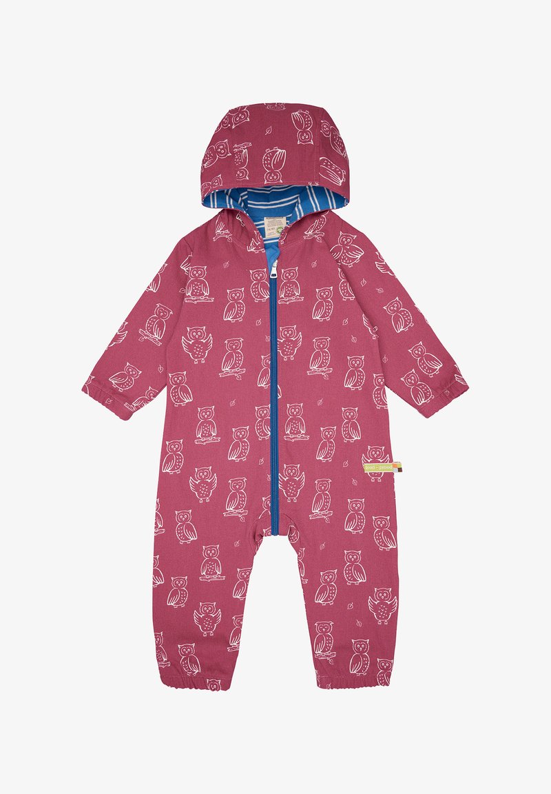 Roze overall voor kinderen met witte uil prints. Kenmerken zijn een blauwe rits en capuchon, elastische manchetten en een gestreepte voering. Zachte stof.
