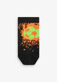 Svarta strumpor med ett livligt orange och grönt mönster av en fotboll med pixelerade detaljer som skapar ett dynamiskt mönster. Tillverkade av elastiskt material.