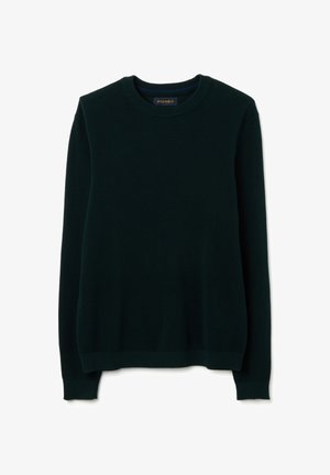 Maglione a girocollo lavorato a maglia verde scuro con maniche lunghe, polsini e orlo a costine, caratterizzato da un motivo testurizzato e un'etichetta all'interno del colletto.