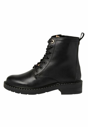 Bottines à plateau - black comb
