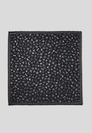 Carré de tissu noir orné d'un motif comprenant des lettres, des icônes et des signatures dorées et argentées dispersées, avec "Karl Lagerfeld" inscrit dans les coins.