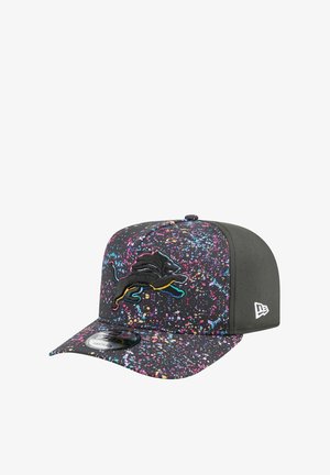 Black cap with colorful splatter pattern; features an embroidered black lion logo, flat brim, and perforated side panels for breathability.