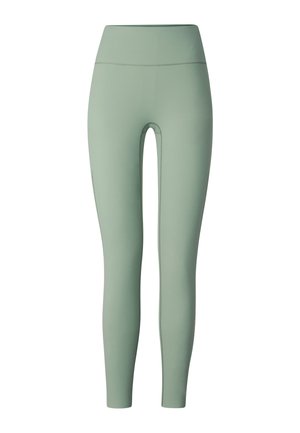 High-waist light green seamless leggings with a smooth finish and ankle-length design.