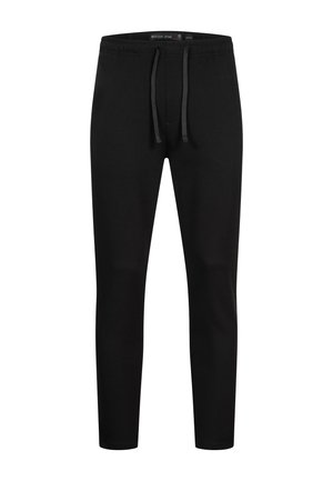 Pantalons de survêtement noirs en tissu doux, avec une taille élastique à cordon de serrage, un design de jambe fuselée, et sans motifs ni accents visibles.