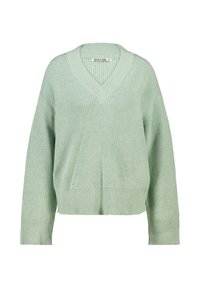 Pull en maille côtelée, vert clair, à coupe ample, avec un décolleté en V profond et des manches larges. Possède un tissu texturé et une longueur cropped.