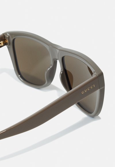 Gucci Solbriller - grey-grey-brown
