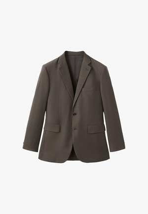 Bruine blazer van gestructureerde stof, met een reverskraag, twee zakken aan de voorkant en een enkele knoopsluiting.