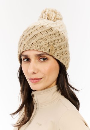 Knit beanie in light beige featuring a textured zigzag pattern and a pom-pom on top. Logo tag visible on the side.